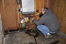 Mechanic checking the furnace