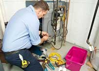 Mechanic checking the furnace