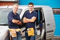 Two mechanics posing in the picture