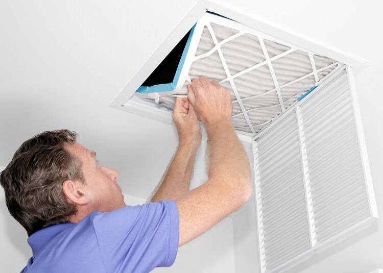 Man Cleaning the Air Vents - Triple T