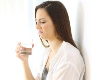 The girl Drinking cold water in winter at St. George, UT