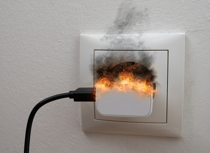 Black smoke and sparks coming from charger