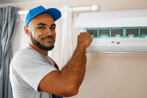 HVAC technician installing AC