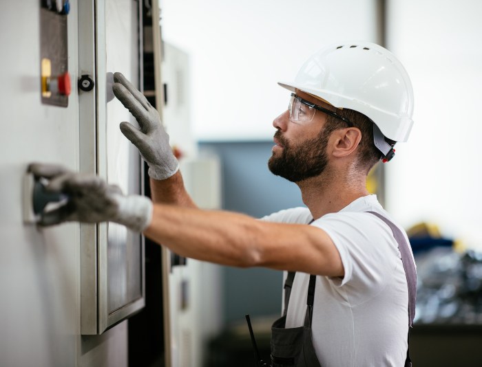 technician checking in electrical safety inspection in Utah